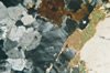(a) El Capitan Granite (sample RYG-14): plagioclase,
K-feldspar, biotite (two grains, one with radiohalos), zircon, quartz
