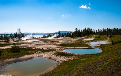 Numerical Simulation of Precipitation in Yellowstone National Park with a Warm Ocean: Continuous Zonal Flow, Gulf of Alaska Low, and Plunging Western Low Case Studies
